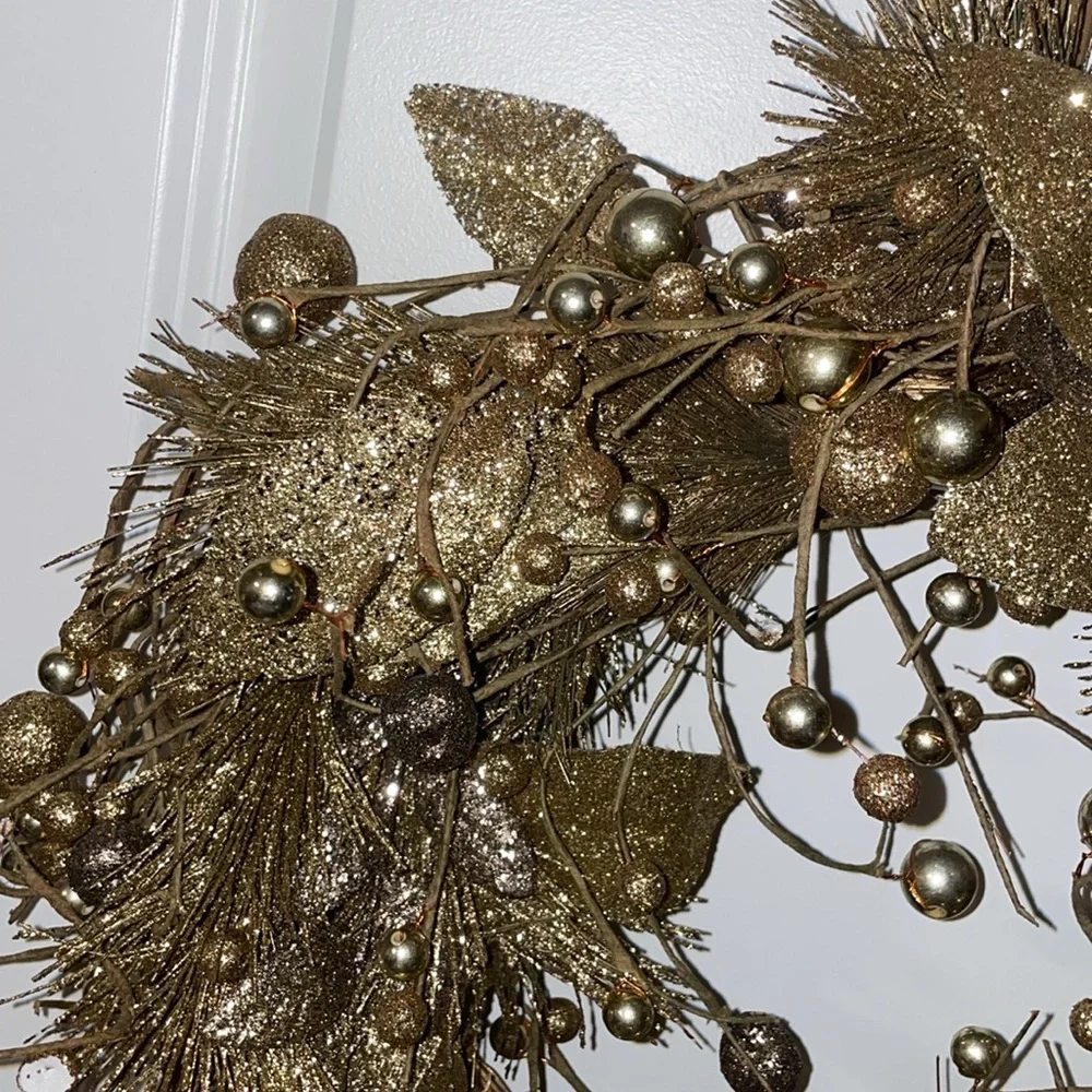 Golden decorative handing wreath